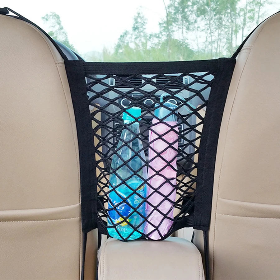 Pet car barrier with safety mesh and storage bag.
Protects back seat and keeps pets secure.