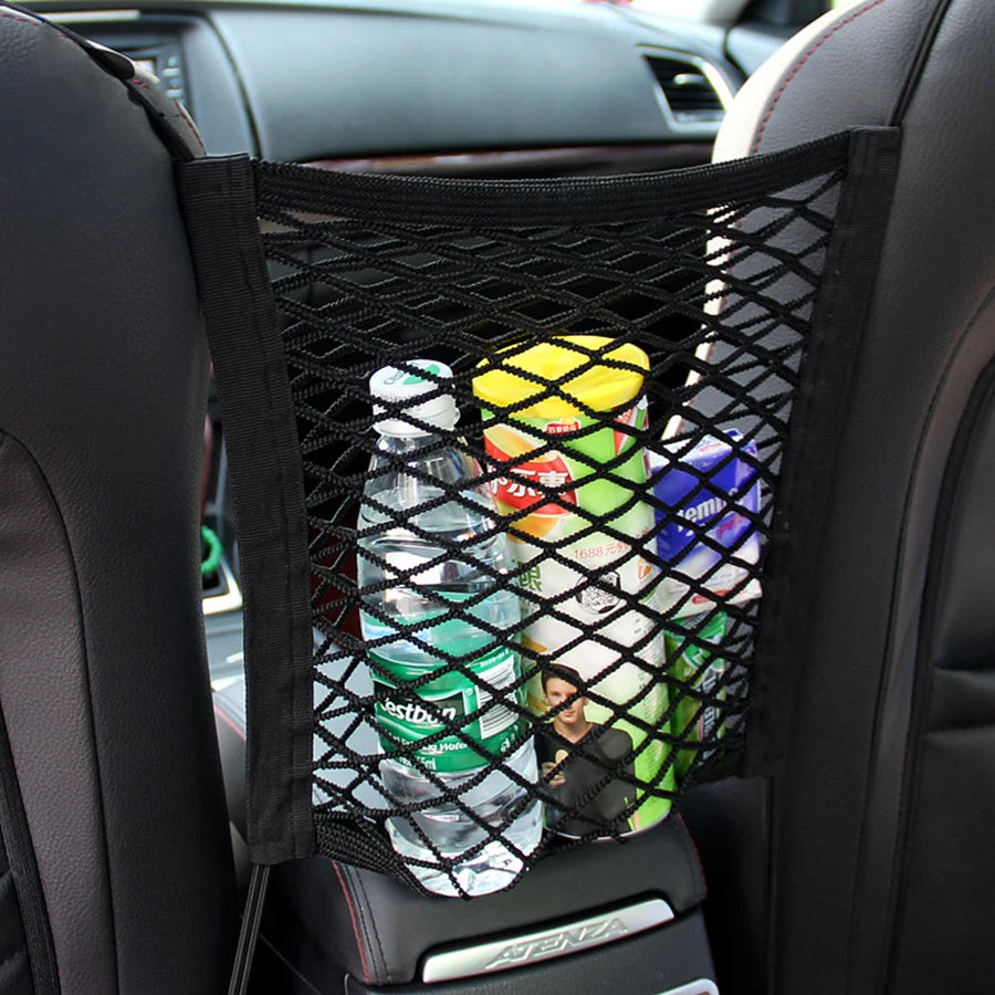 Pet car barrier with safety mesh and storage bag.
Protects back seat and keeps pets secure.